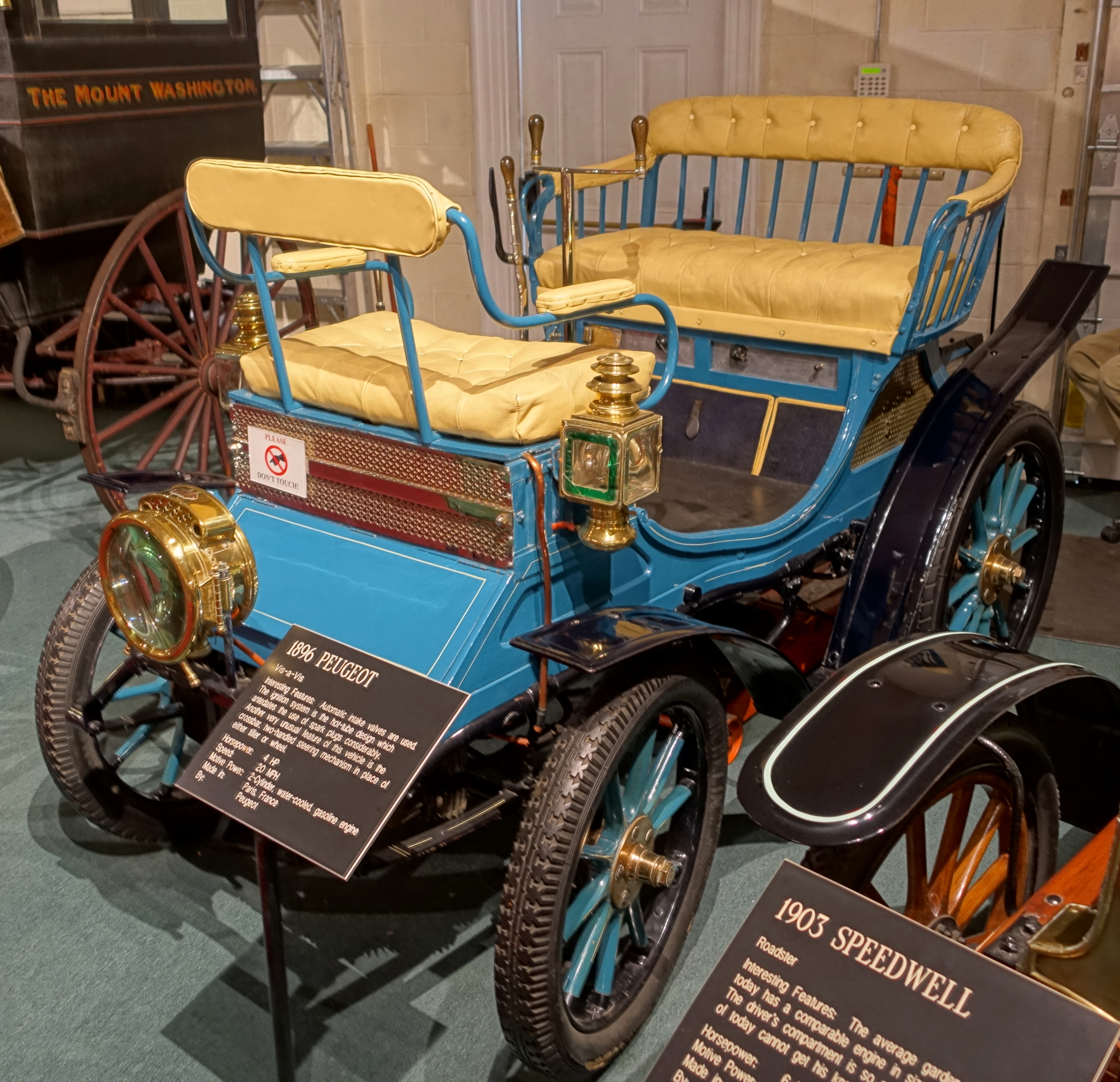 Peugot_Vis-a-Vis_1896_made_by_Peugot_Paris_France_4_HP_2_cylinder_gasoline_engine_-_Luray_Caverns_Car_and_Carriage_Museum_-_Luray_Virginia_-_DSC01195